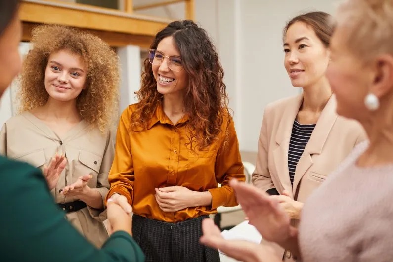 group of women in conversation