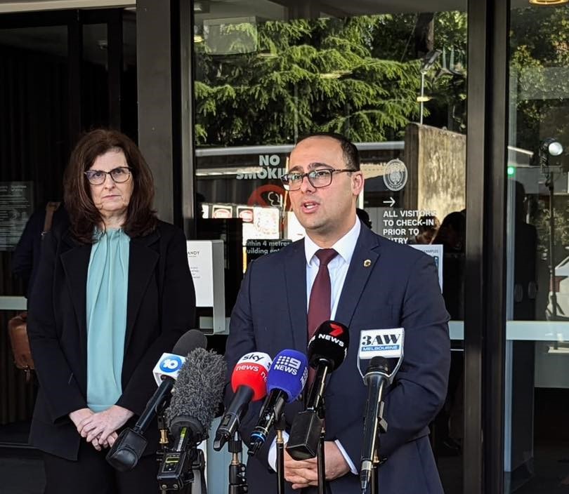 Marnie Williams and Enver Erdogan speaking to media at a press conference.