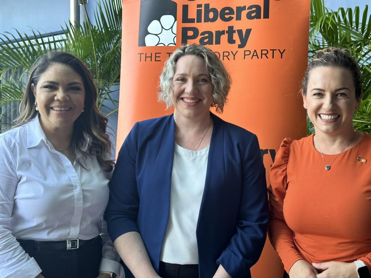 Jacinta Price, Lisa Bayliss and Lia Finocchiaro standing in front of a CLP banner.