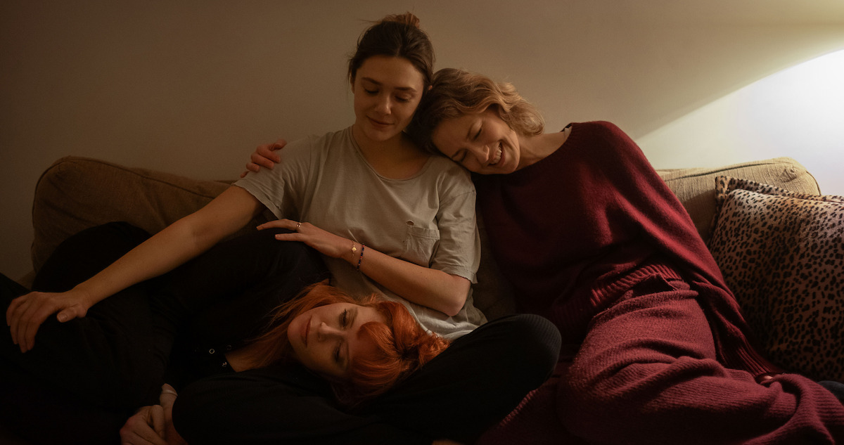 movie still of three women on a couch