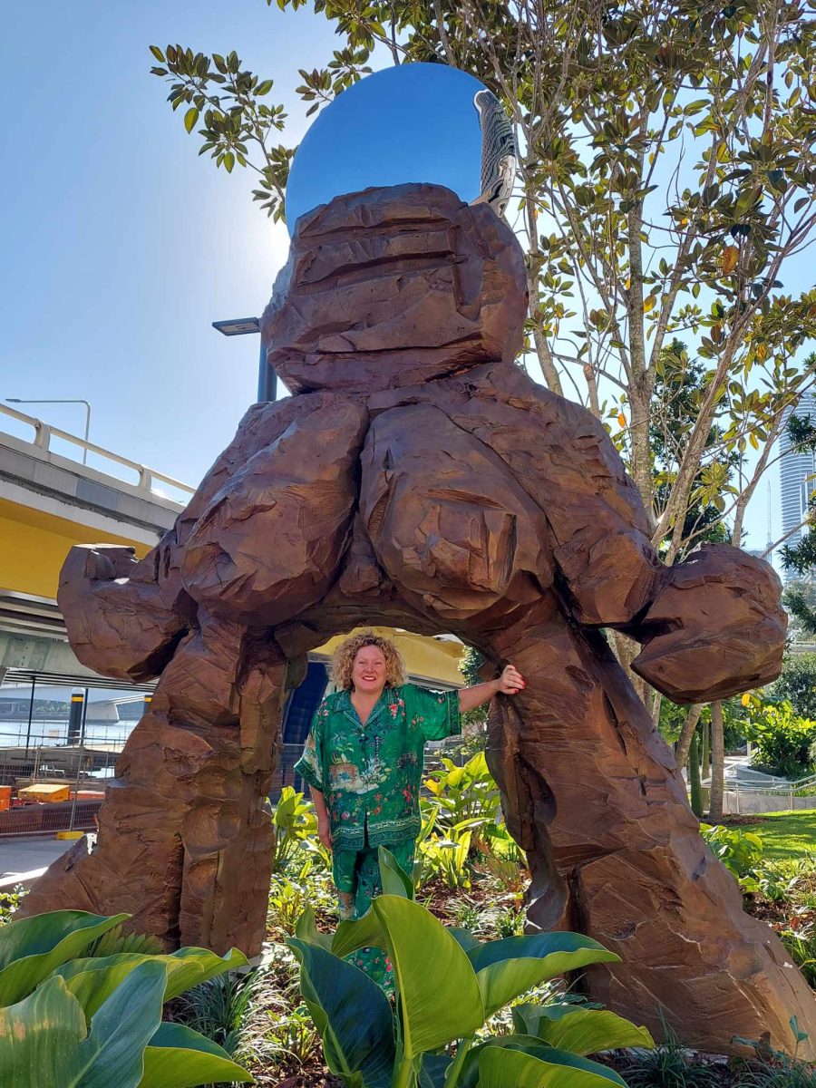 woman and a sculpture