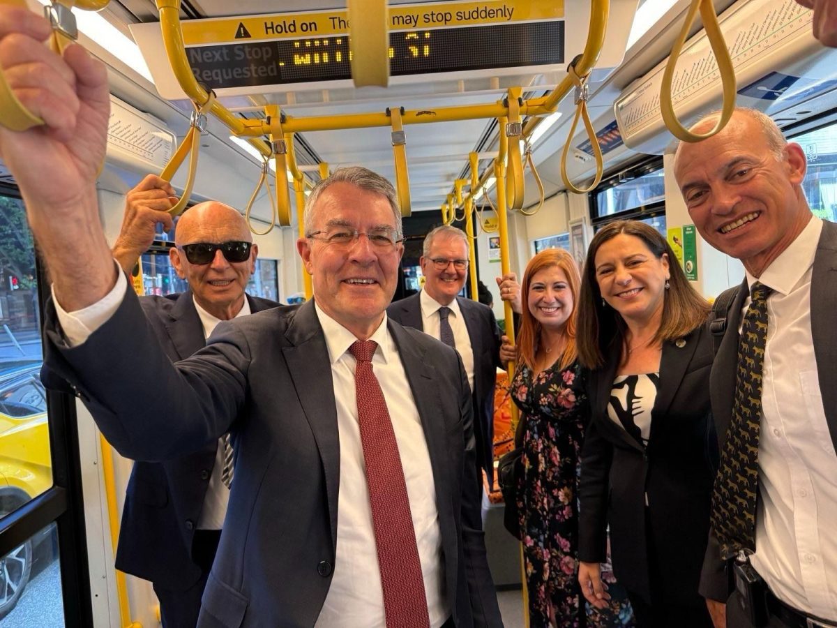 group of people standing in a bus