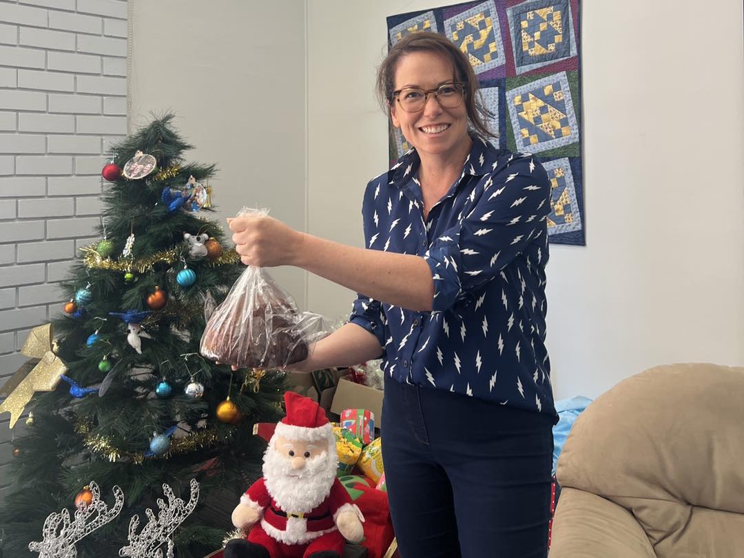 smiling woman with Christmas decorations