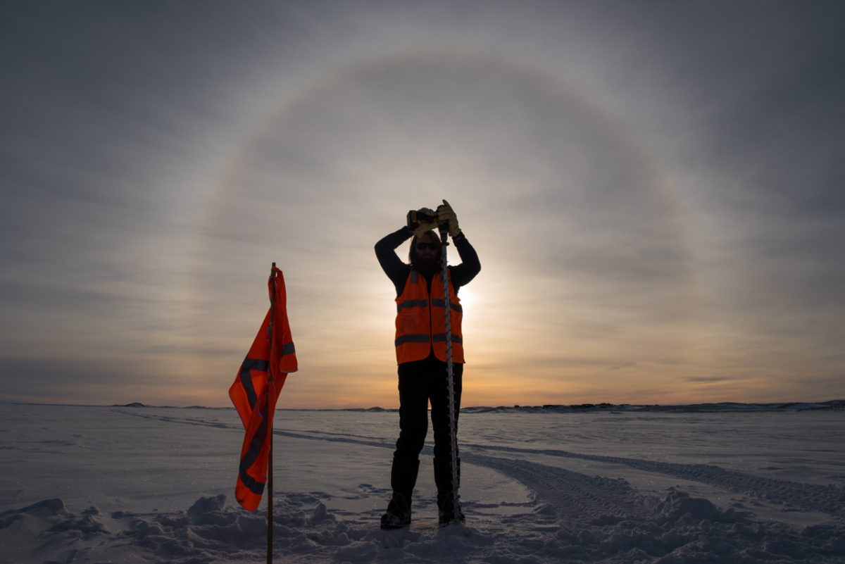 a person recording observational weather data 