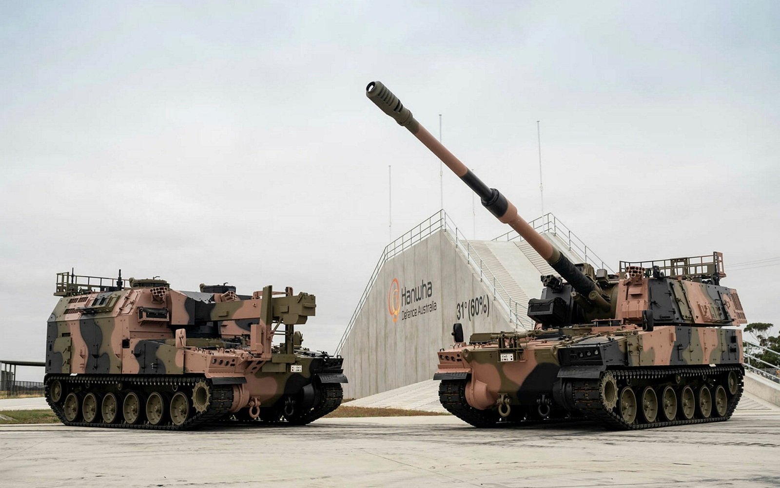 The AS10 resupply vehicle (left) and AS9 Huntsman are built on a common chassis and running gear.