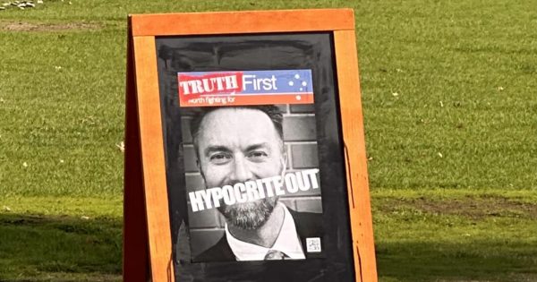 Riverina Family First candidate's image appears at former Michael Slater Oval with 'Hypocrite Out' message