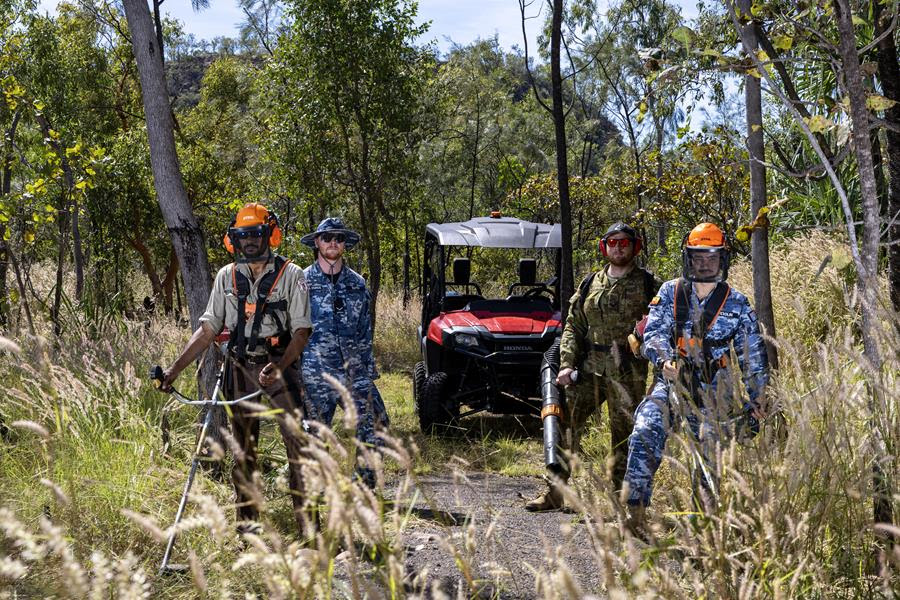 Aviators from RAAF Base Tindal and Northern Territory Parks and Wildlife rangers clear the Jatbula Trail.