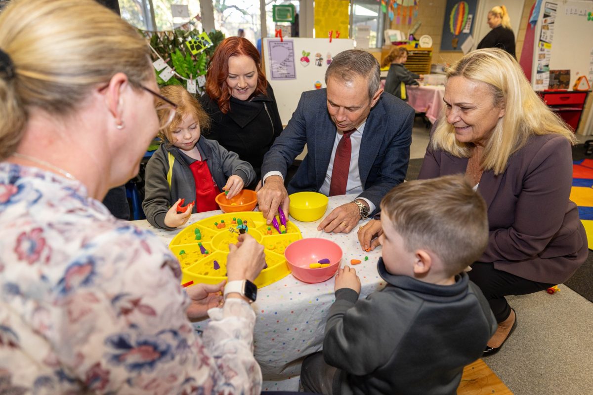 adults and kids at a kindy 