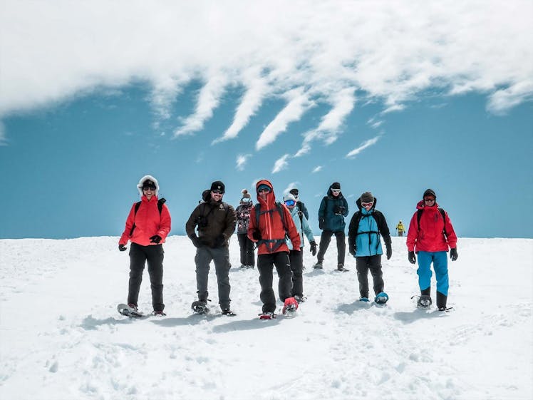 people snowshoeing