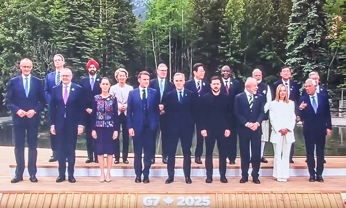 A group of men and women on a stage
