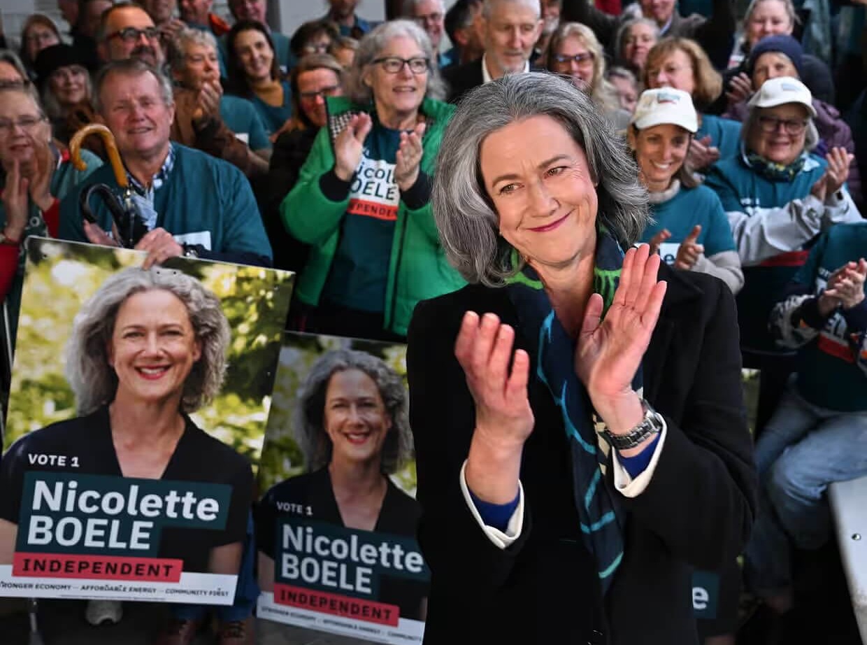 election candidate with her supporters