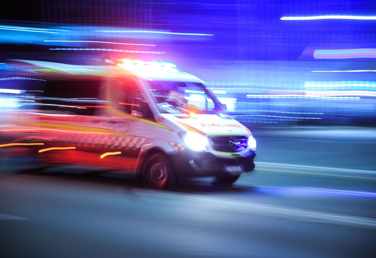 ambulance on the move with lights on
