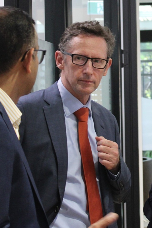 man in a suit in an office