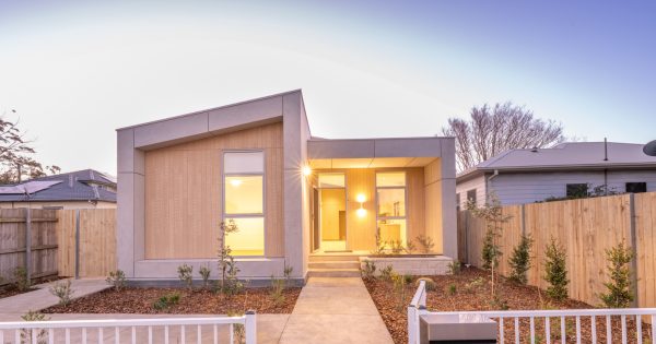 Doors to NSW’s first modular social housing open to its new residents in Wollongong