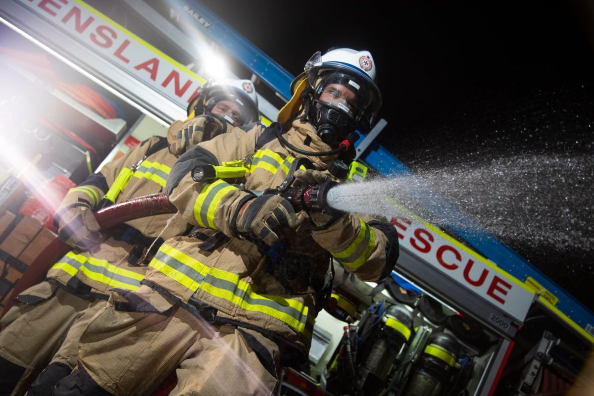 firies spraying water