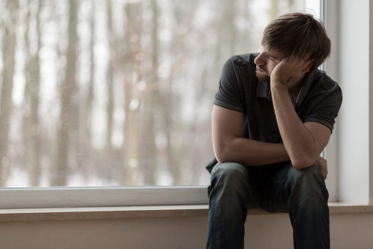 Man contemplating failure