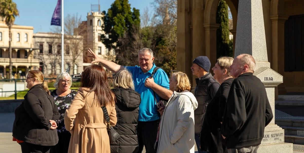 a tour guide with a group of sightseers
