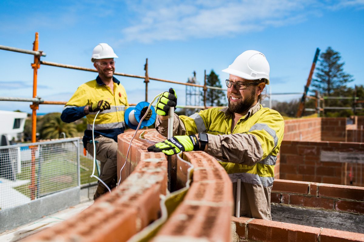 two tradesmen at a construction site