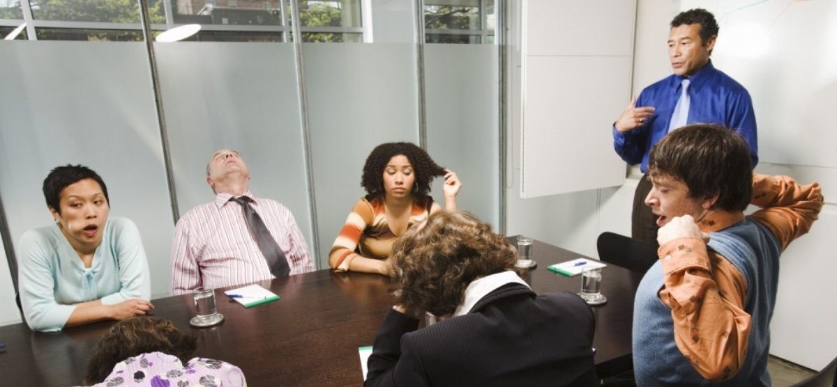 Bored people at meeting