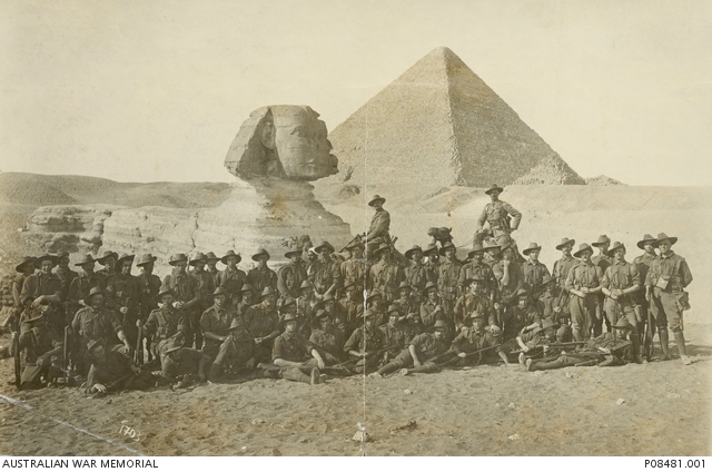 army group posing in front of the sphinx