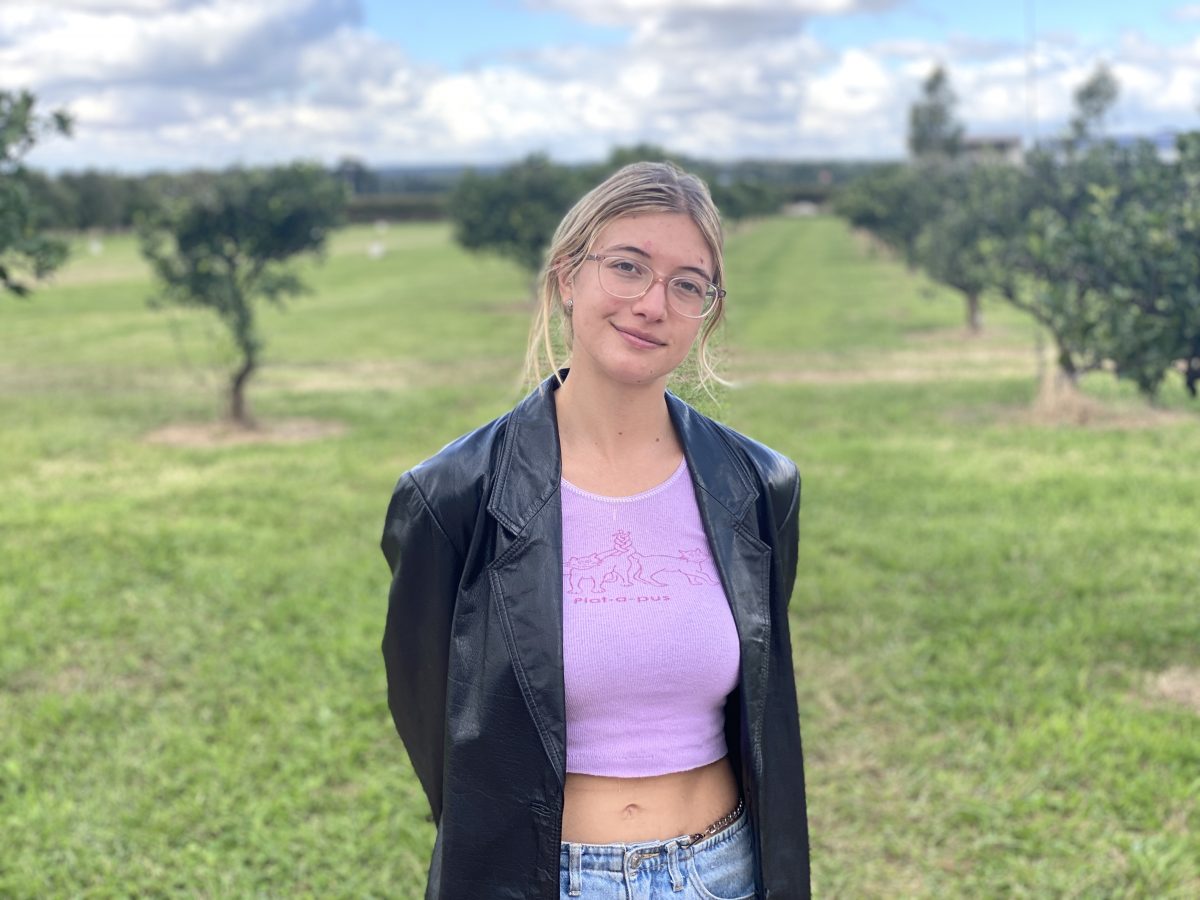 Helaina Beltrame in a green field