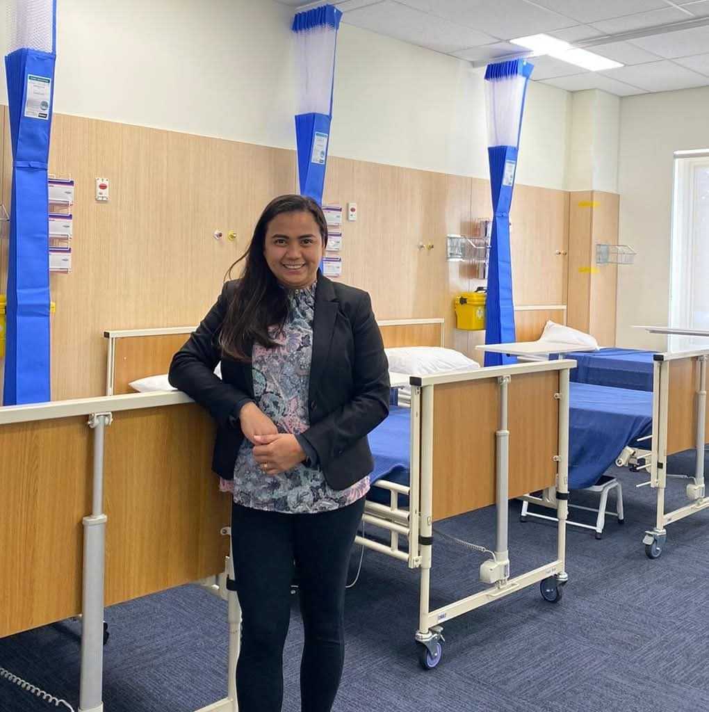 Woman in a hospital room