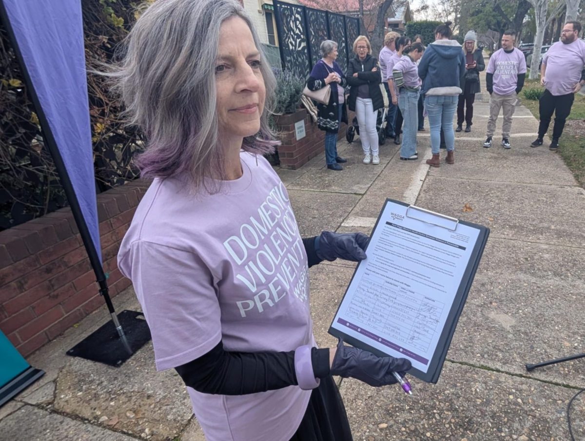 woman holding a petition