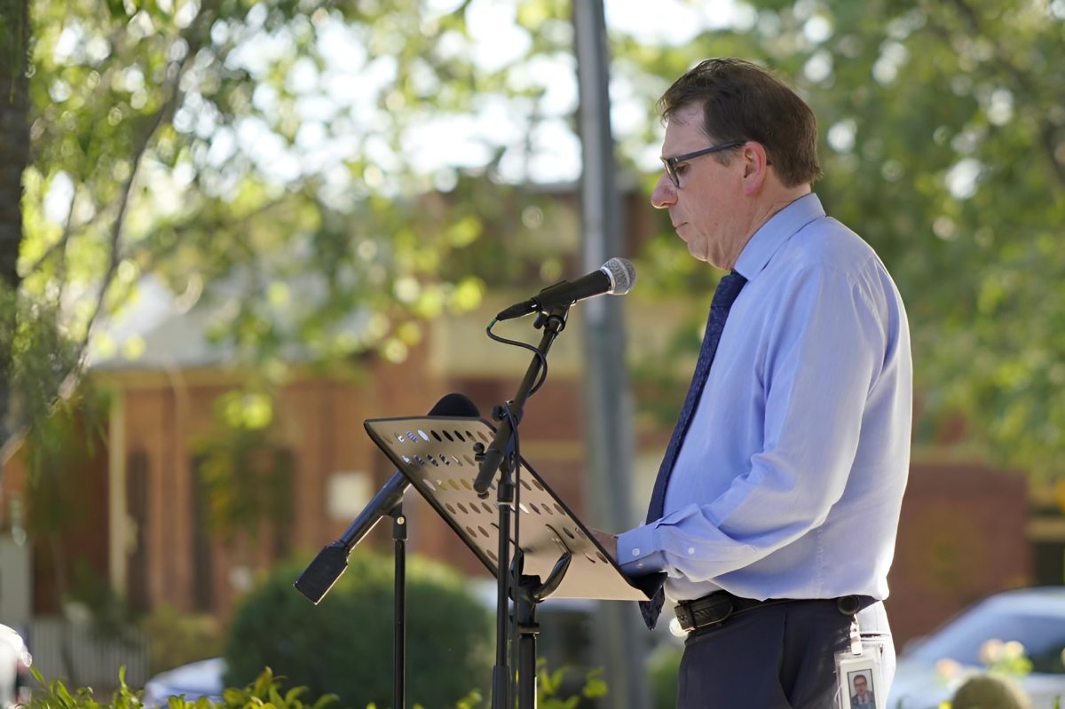 man speaking to an audience