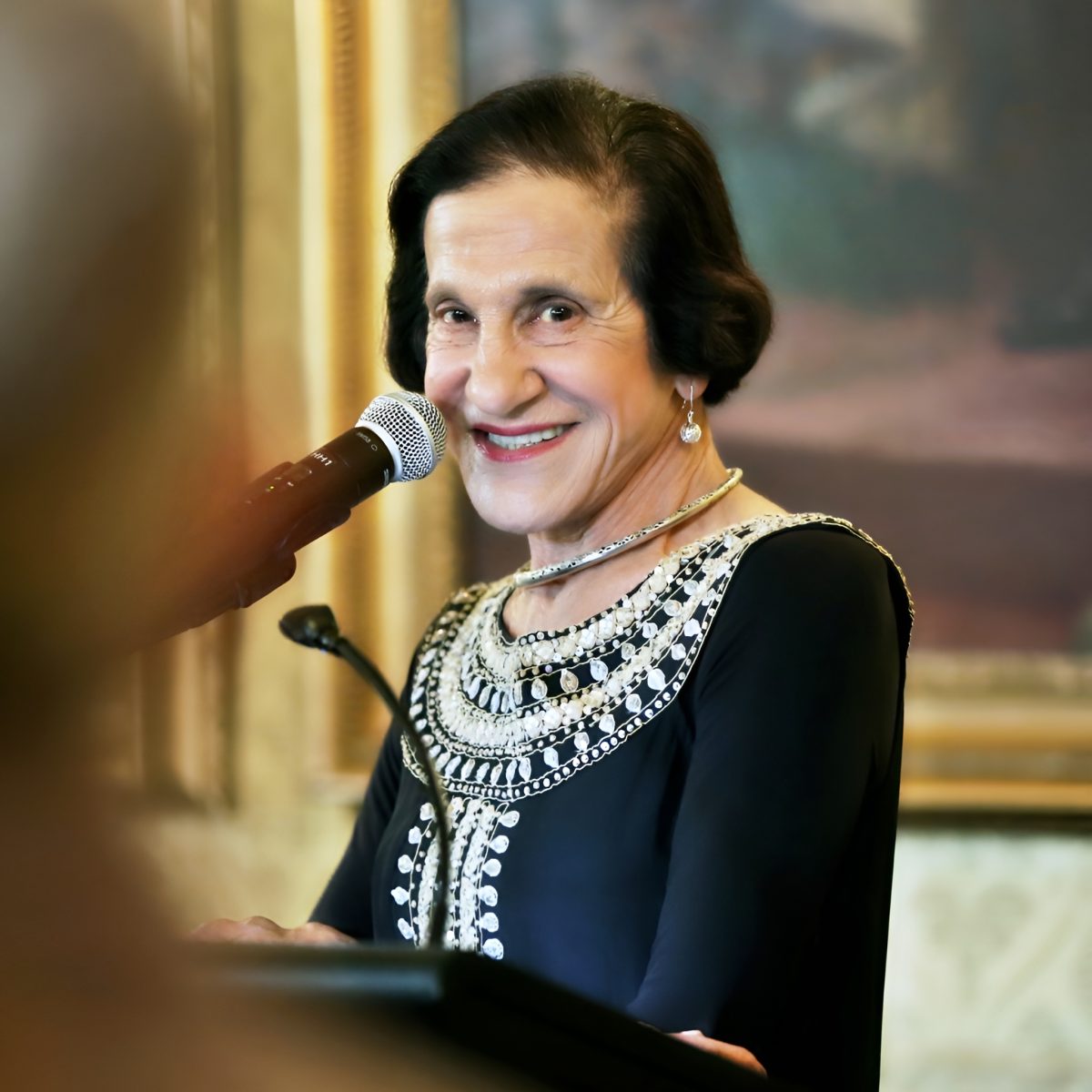 Bashir speaking is podium 