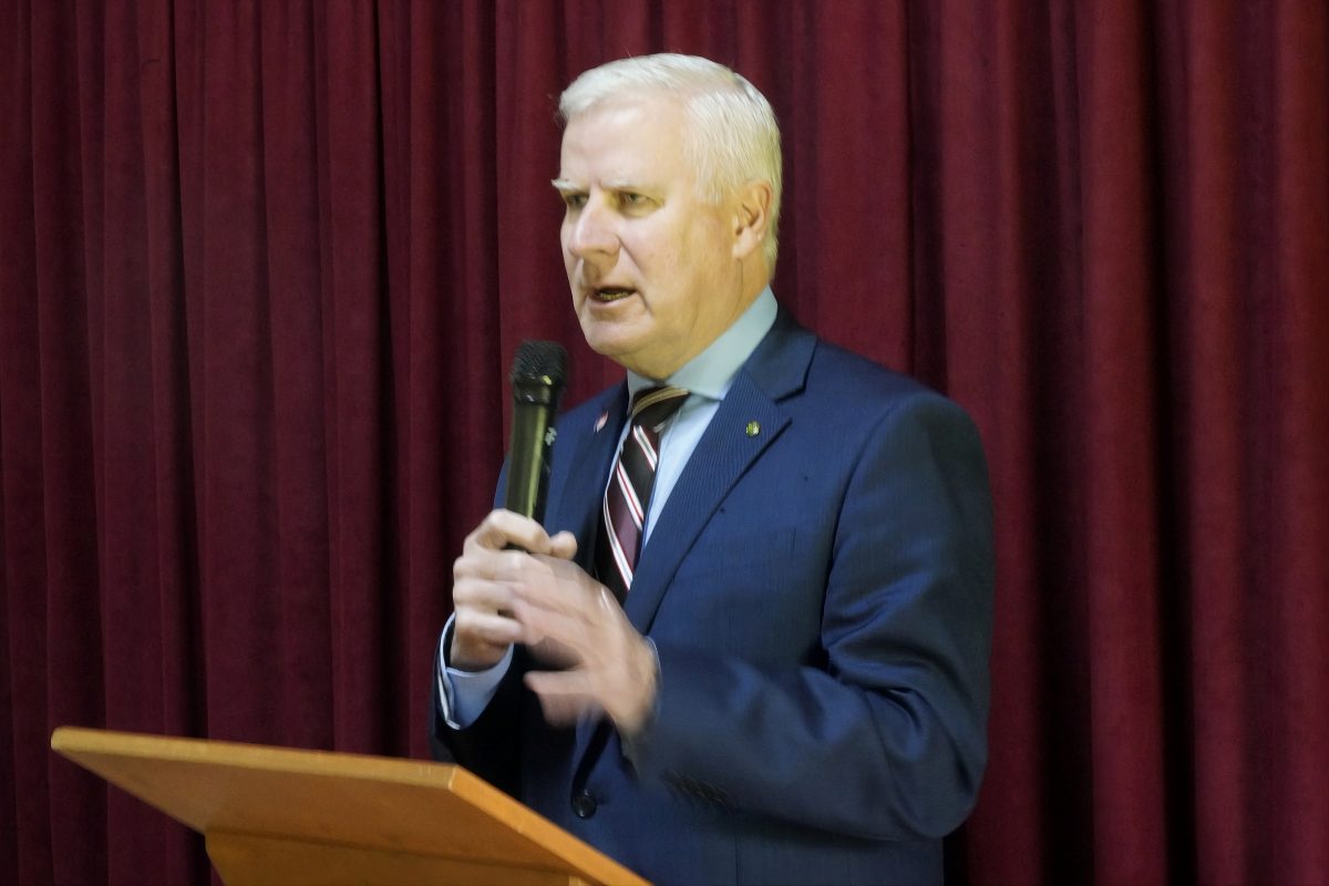 McCormack with microphone